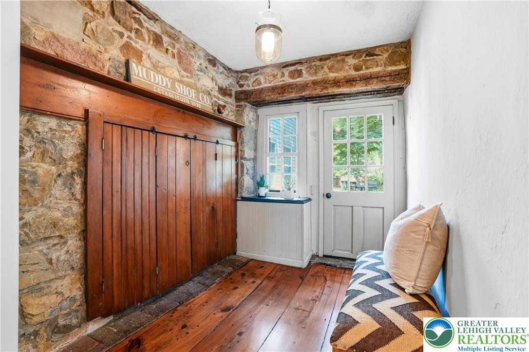2014 Linden Street Bethlehem, PA 18017 - Photo 7 of 85 Hand-hewn beams and rich wood floors anchor this rustic entry with a charming dutch door.