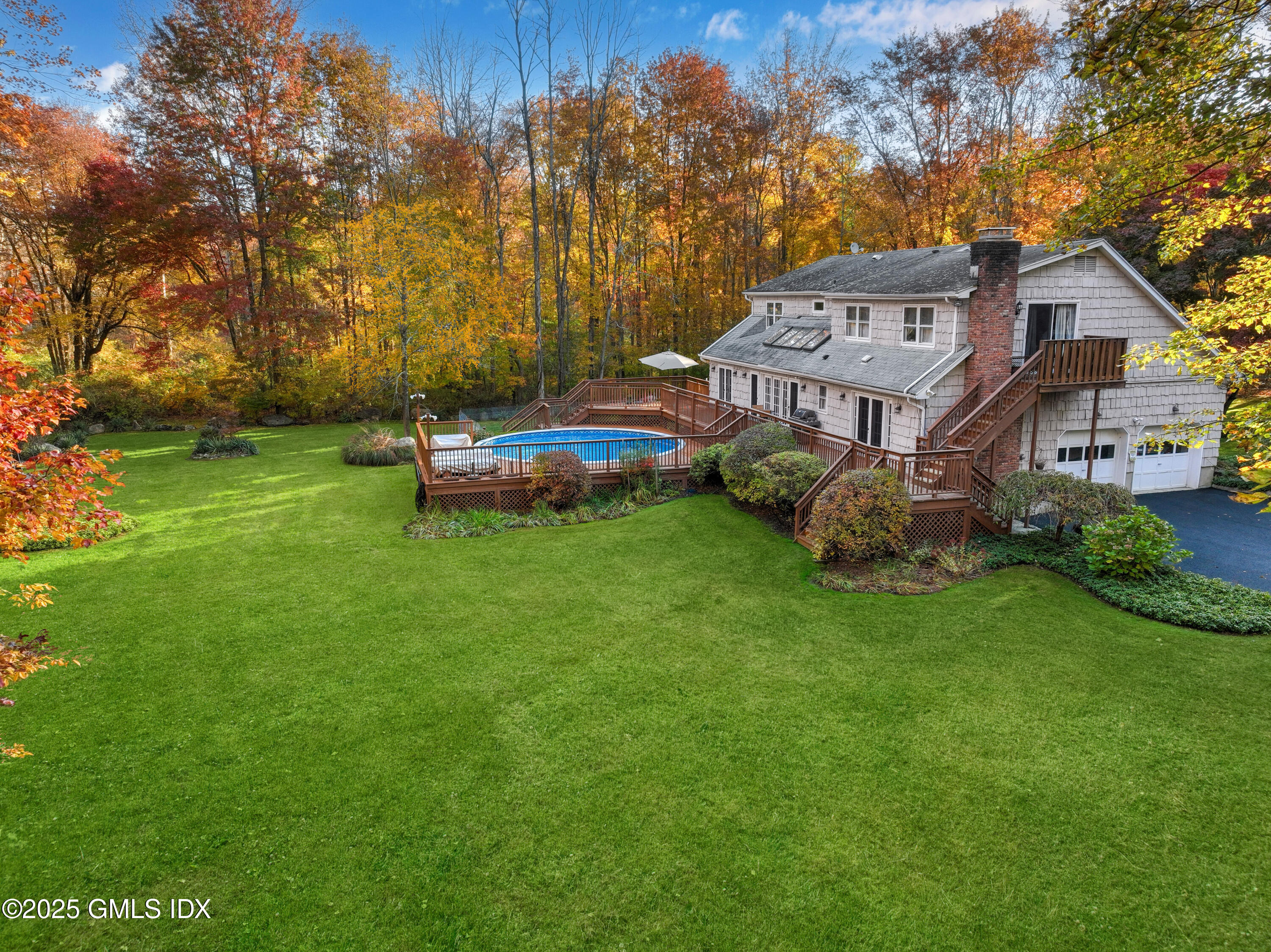 38 Bedford Road Greenwich, CT 06831 - Photo 5 of 33 Expansive back yard with heated pool