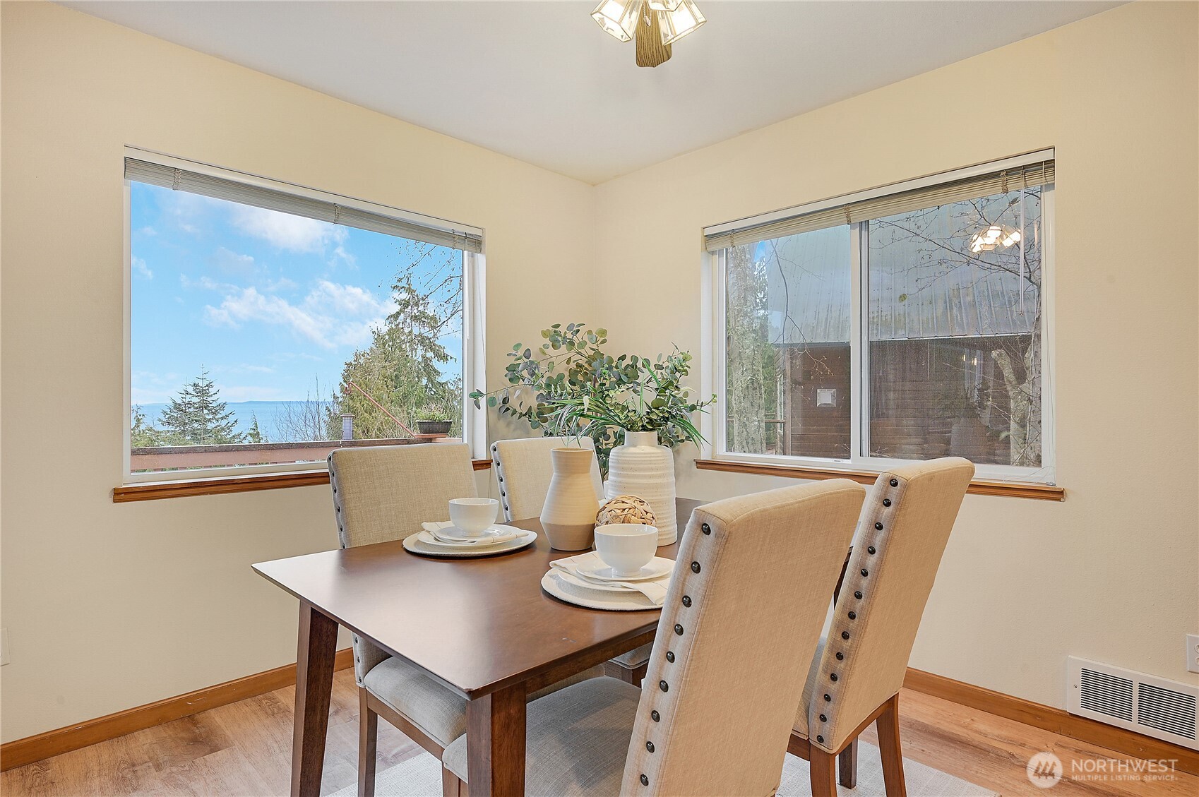 320 North Street Sequim, WA 98382 - Photo 13 of 40 a view of a dining room with furniture window and outside view