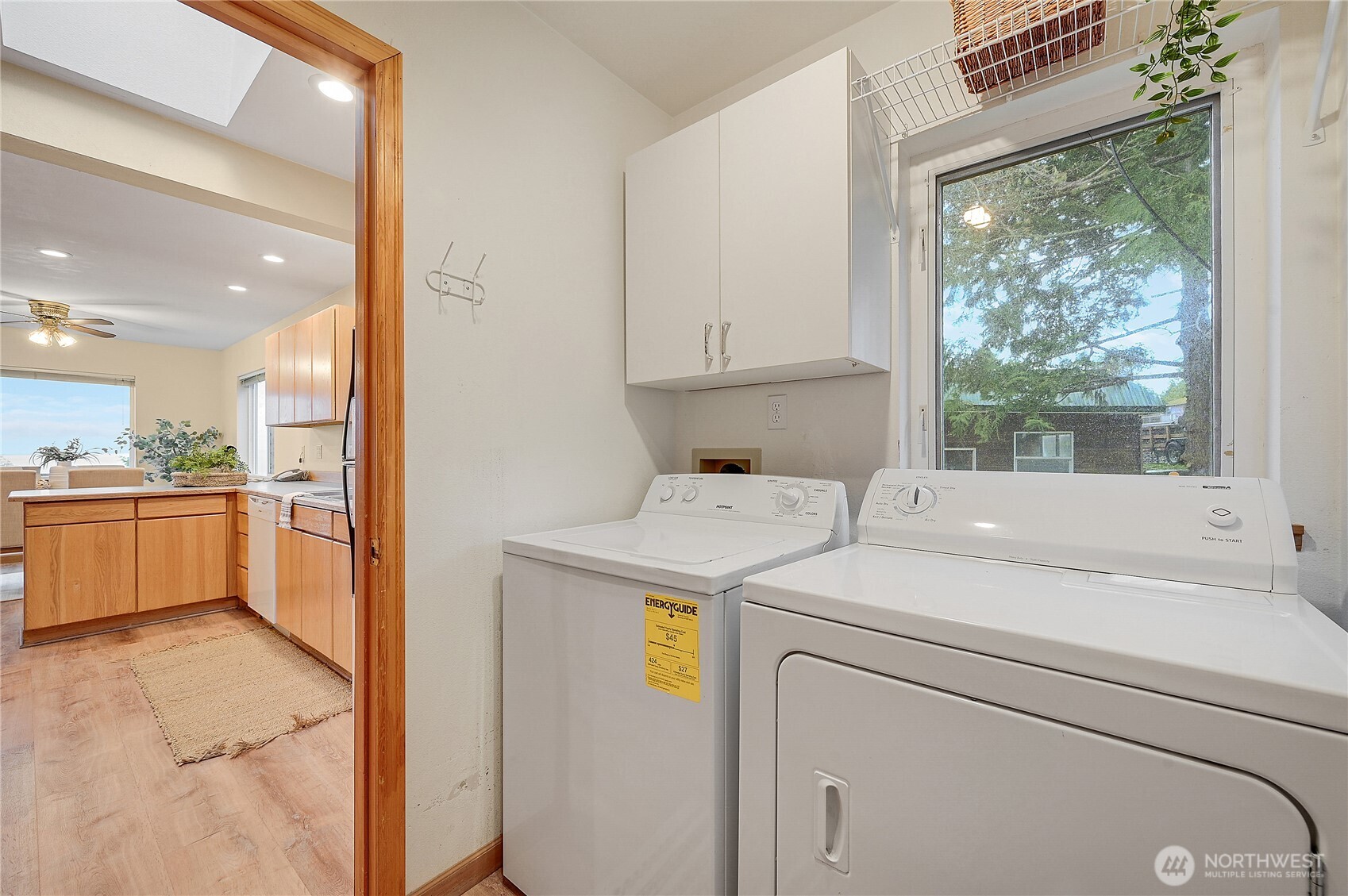 320 North Street Sequim, WA 98382 - Photo 19 of 40 a view of washer and dryer with kitchen view