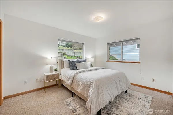 a bathroom with a shower and a sink