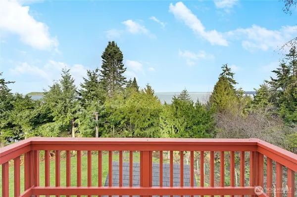 a workspace with furniture and a potted plant