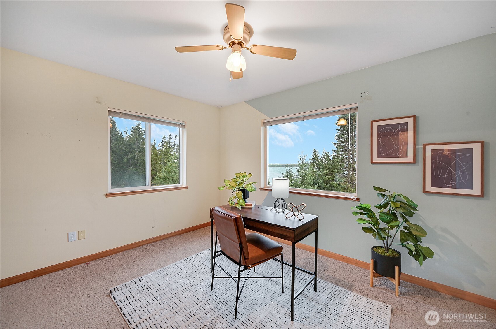 320 North Street Sequim, WA 98382 - Photo 32 of 40 a workspace with furniture and a potted plant