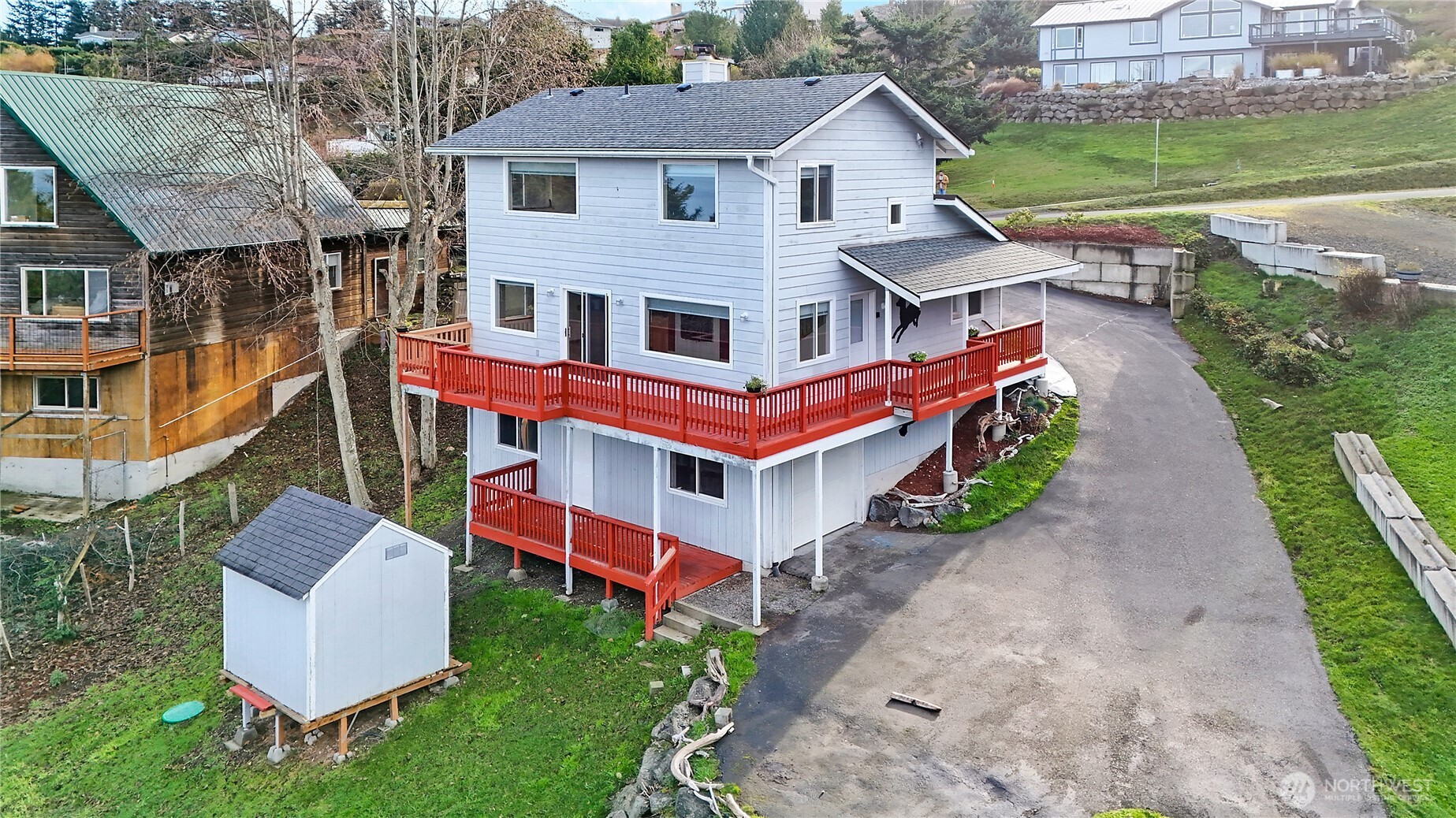320 North Street Sequim, WA 98382 - Photo 39 of 40 an aerial view of a house with a yard table and chairs