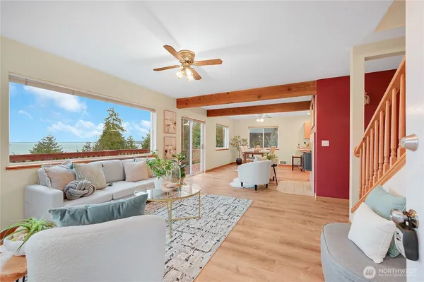 a living room with furniture and view of living room