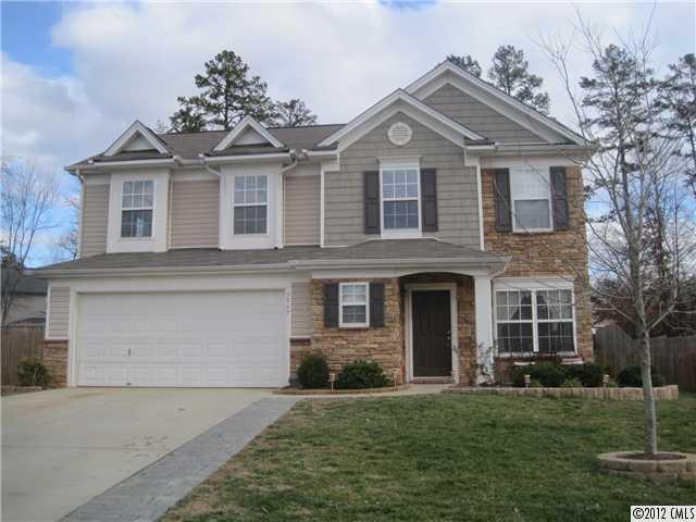 5927 Brightstar Valley Road Mint Hill, NC 28227 - Photo 1 of 14 front view of a house with a yard