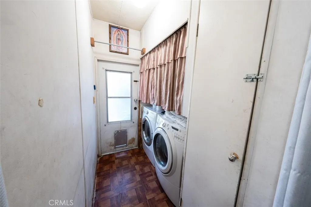 131 South Colombo Tustin, CA 92780 - Photo 12 of 19 a view of a hallway with washer and dryer