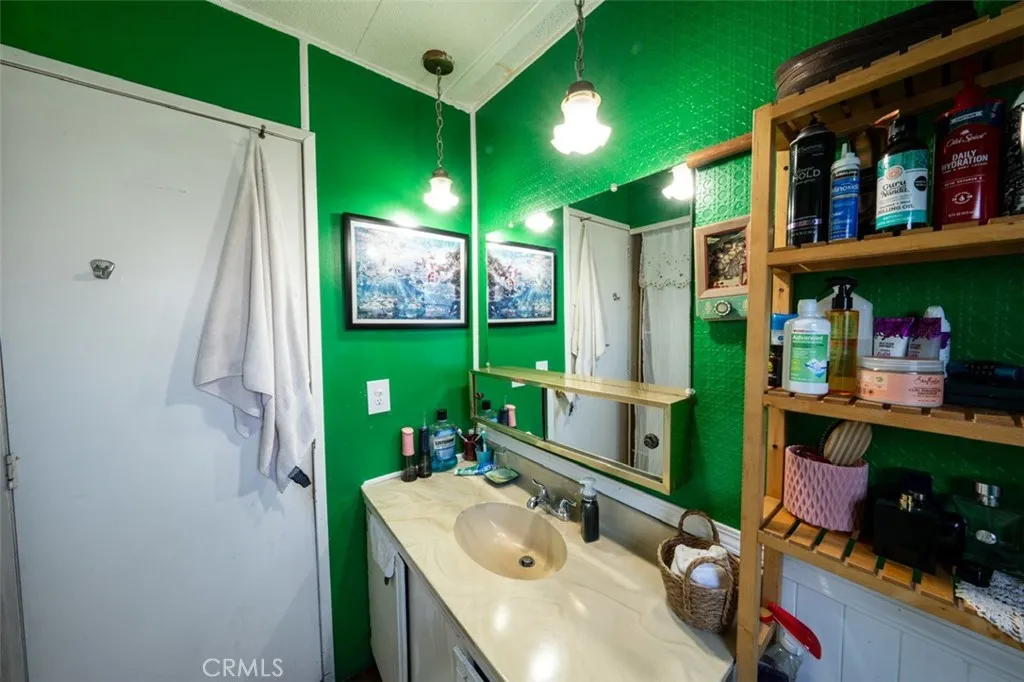 131 South Colombo Tustin, CA 92780 - Photo 13 of 19 a bathroom with a sink mirror and window
