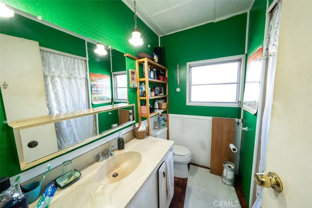 131 South Colombo Tustin, CA 92780 - Photo 14 of 19 a bathroom with a sink mirror vanity and toilet