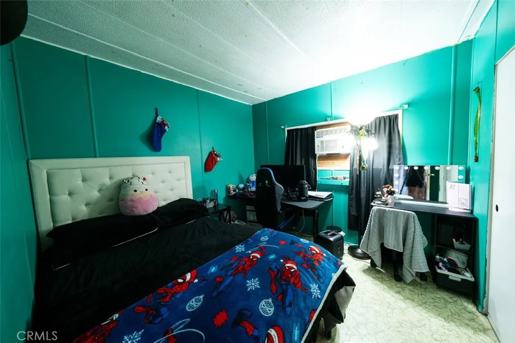 131 South Colombo Tustin, CA 92780 - Photo 16 of 19 a bedroom with a bed and a flat tv screen