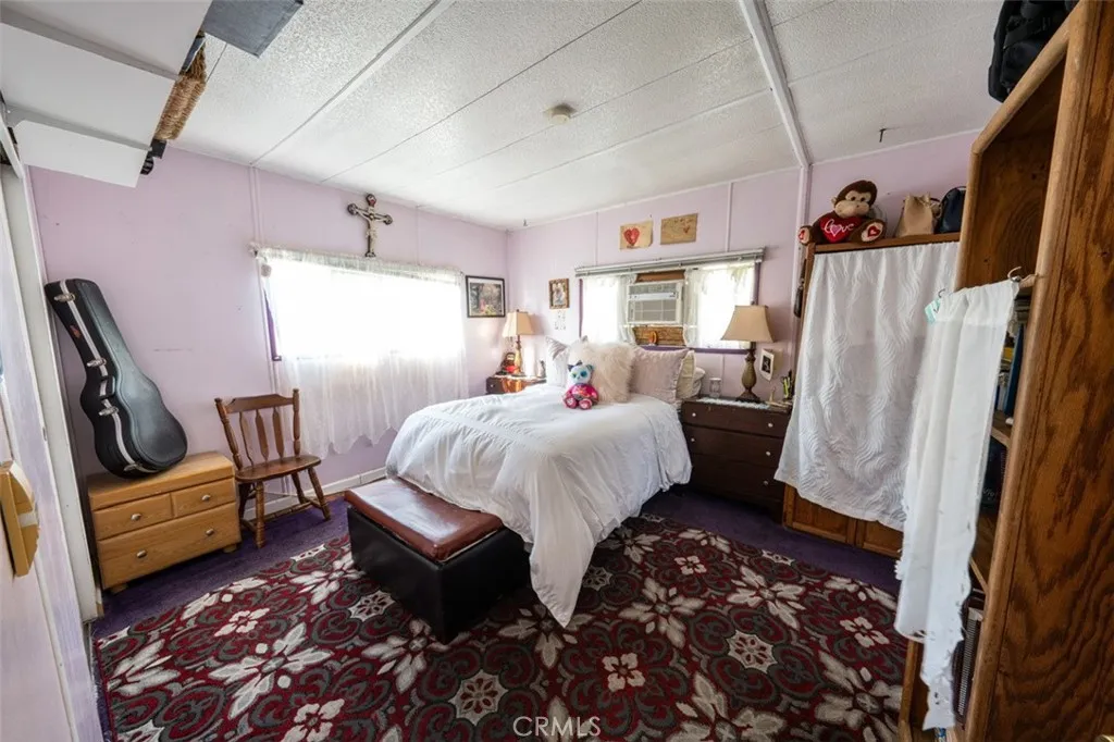 131 South Colombo Tustin, CA 92780 - Photo 18 of 19 a bed room with a bed furniture and a window