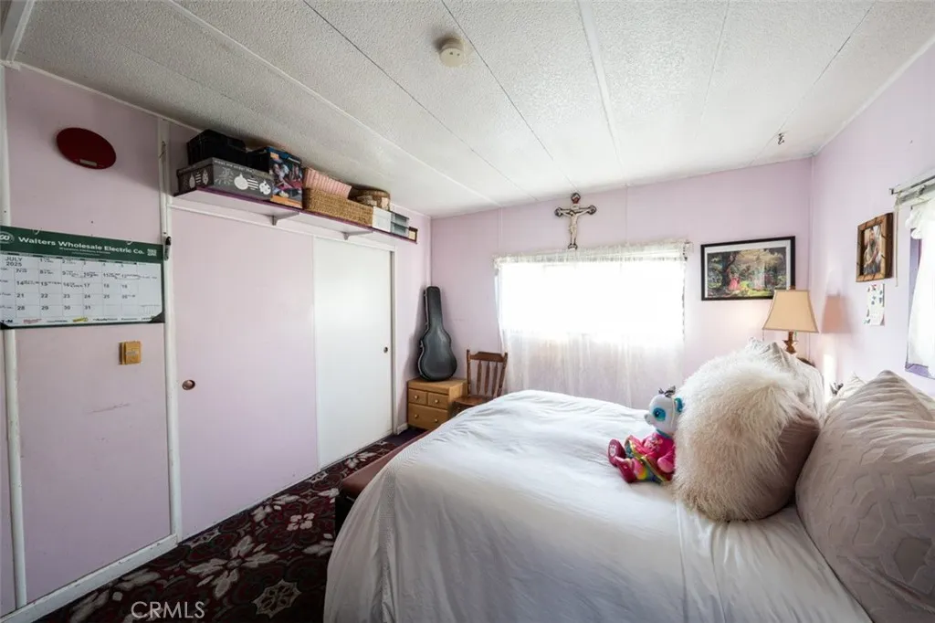 131 South Colombo Tustin, CA 92780 - Photo 19 of 19 a bedroom with a bed and a window
