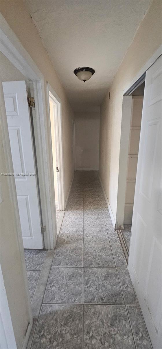 3932 Northwest 207 St Road Miami Gardens, FL 33055 - Photo 14 of 19 an empty room with windows
