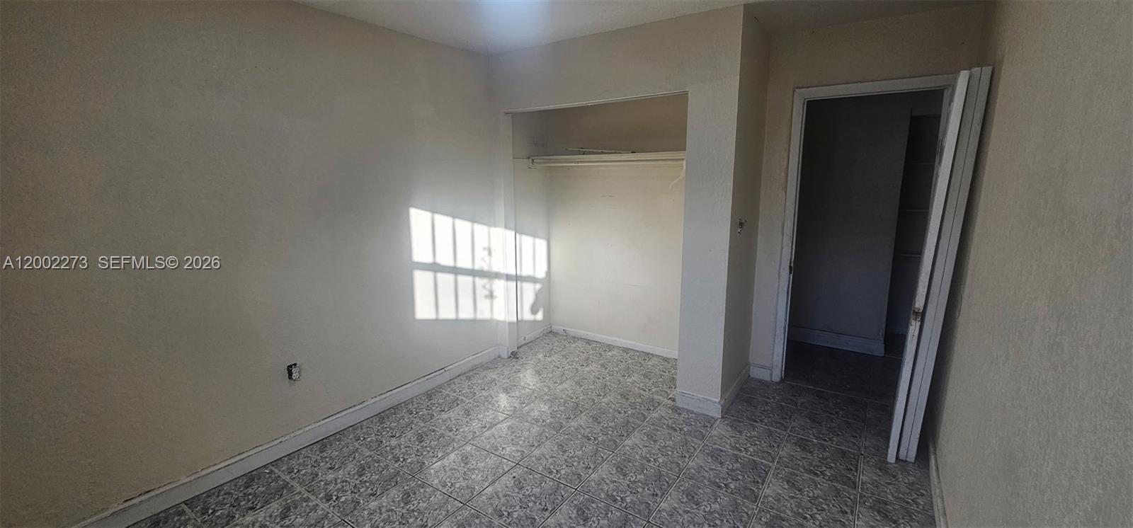 3932 Northwest 207 St Road Miami Gardens, FL 33055 - Photo 16 of 19 a view of hallway with window