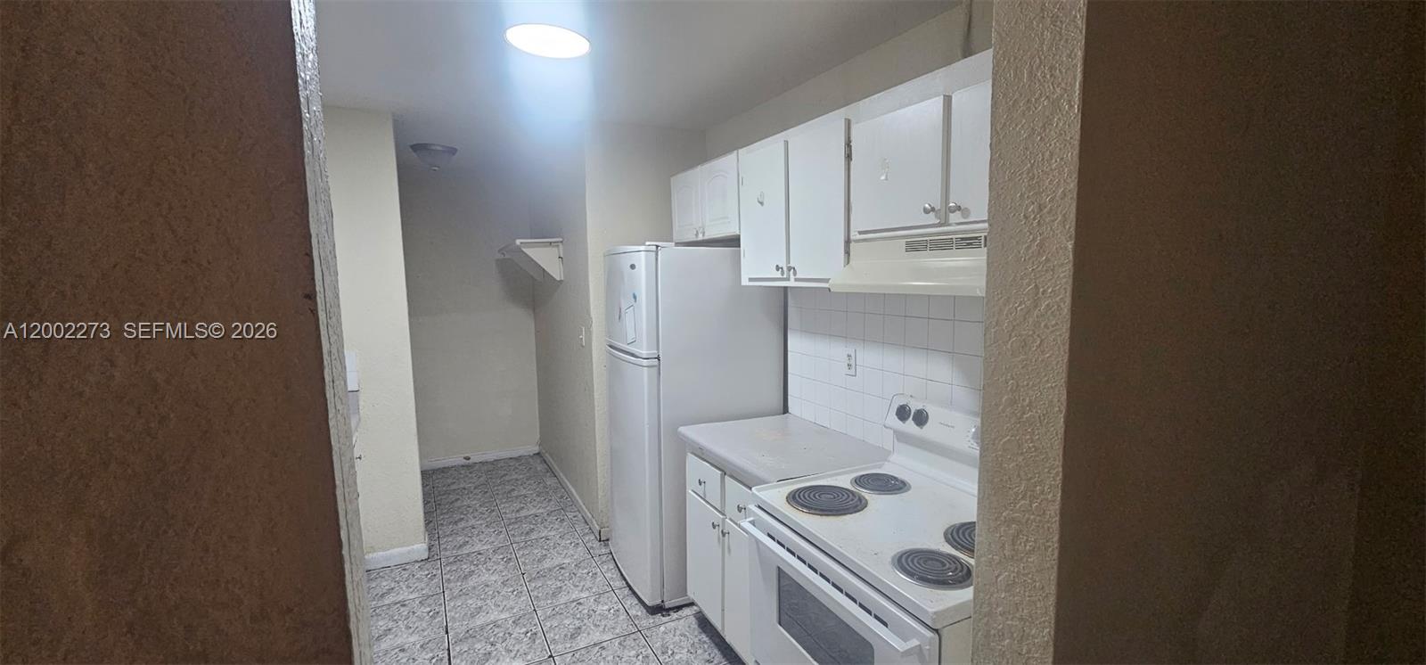 3932 Northwest 207 St Road Miami Gardens, FL 33055 - Photo 5 of 19 a view of kitchen and sink