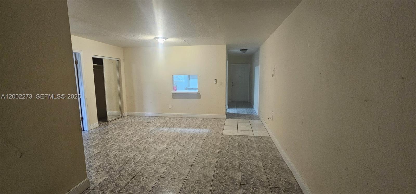3932 Northwest 207 St Road Miami Gardens, FL 33055 - Photo 7 of 19 an empty room with windows