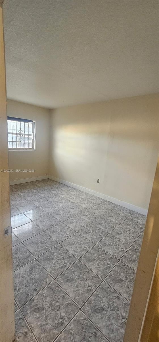 3932 Northwest 207 St Road Miami Gardens, FL 33055 - Photo 8 of 19 wooden floor in a empty room