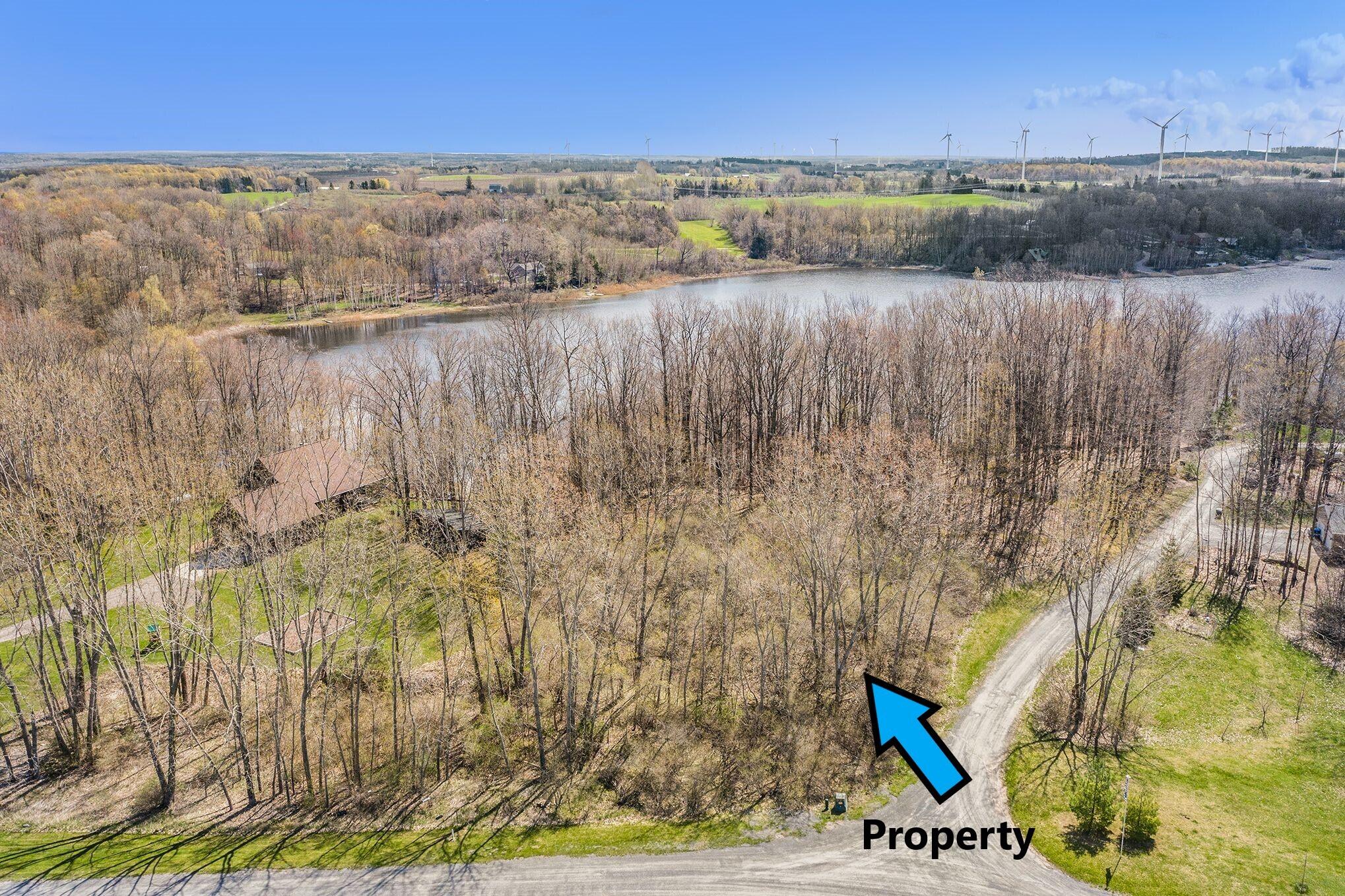 5424 West Oak Point Road Ludington, MI 49431 - Photo 3 of 12 Aerial Property View with Arrows