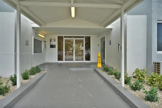a view of a swimming pool with a terrace