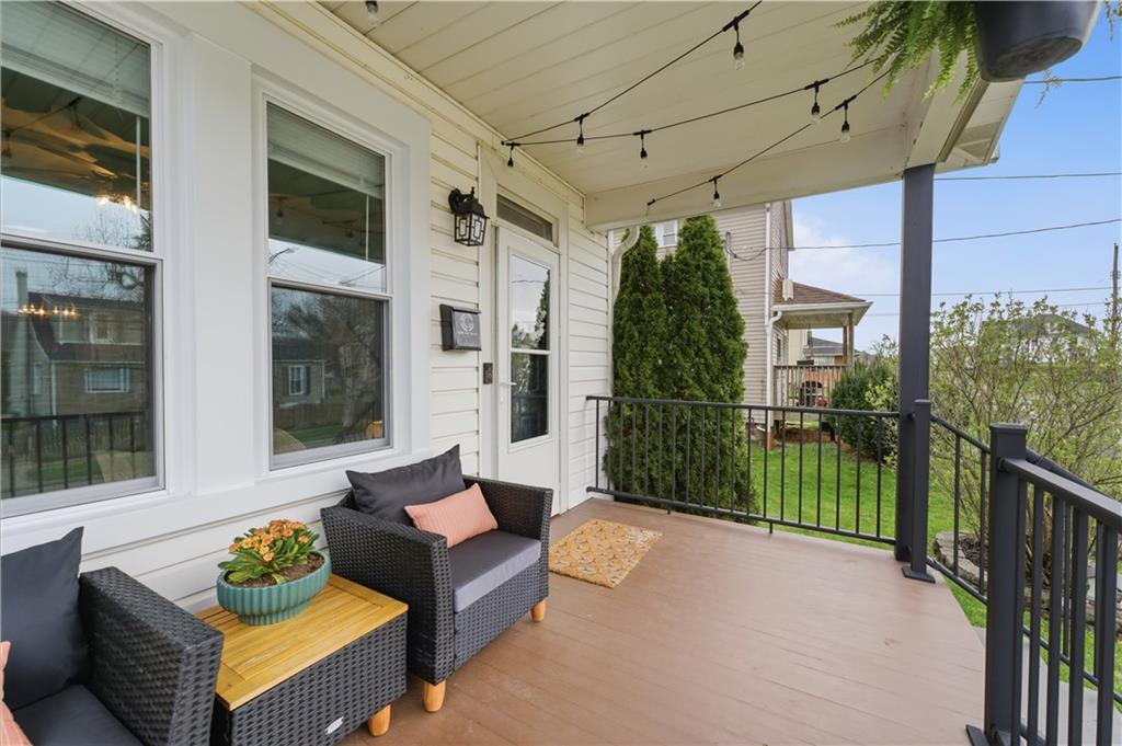 1438 4th Street Natrona Heights, PA 15065 - Photo 12 of 33 a balcony with furniture and a potted plant