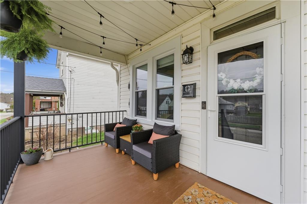 1438 4th Street Natrona Heights, PA 15065 - Photo 13 of 33 a balcony with furniture and a potted plant