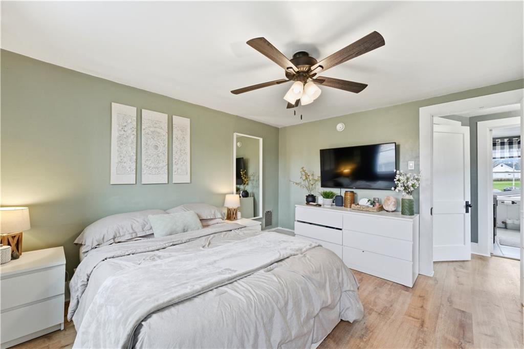 1438 4th Street Natrona Heights, PA 15065 - Photo 26 of 33 a bedroom with a bed and a flat screen tv