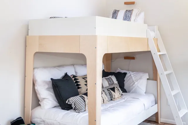 a balcony with two couches and a coffee table