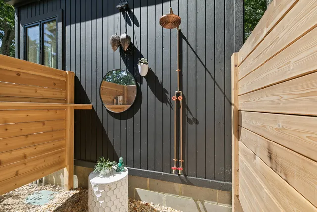 a view of a balcony with furniture