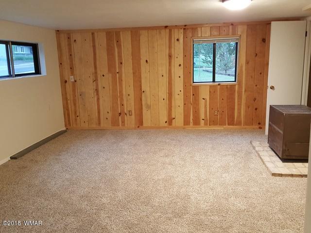 1128 East Maricopa Drive Springerville, AZ 85938 - Photo 18 of 28 a view of an empty room with a window