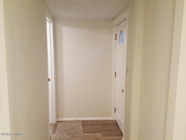 1128 East Maricopa Drive Springerville, AZ 85938 - Photo 26 of 28 a view of hallway with closet