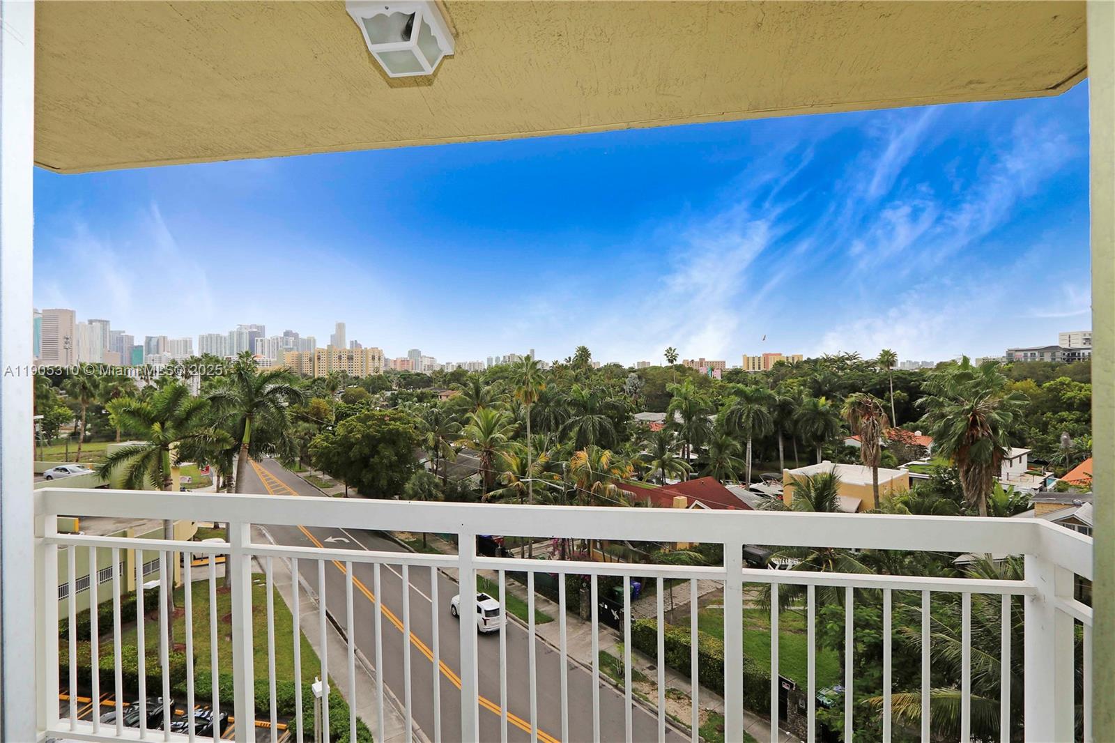 816 Northwest 11th Street, Unit 610 Miami, FL 33136 - Photo 2 of 28 a view of a red and white house in a big yard