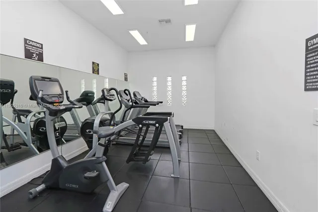 a view of a room with gym equipment