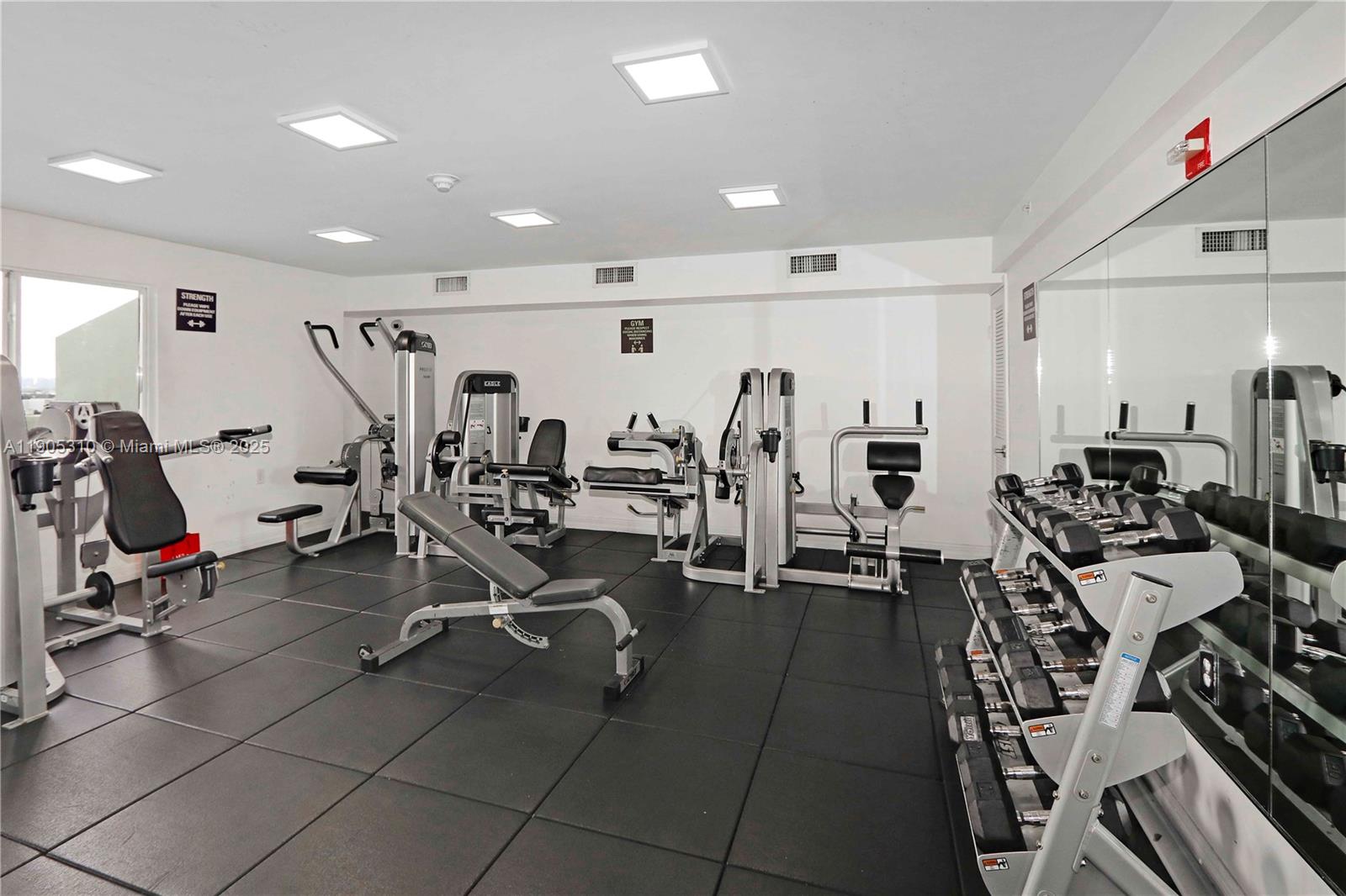 816 Northwest 11th Street, Unit 610 Miami, FL 33136 - Photo 23 of 28 a view of a room with gym equipment