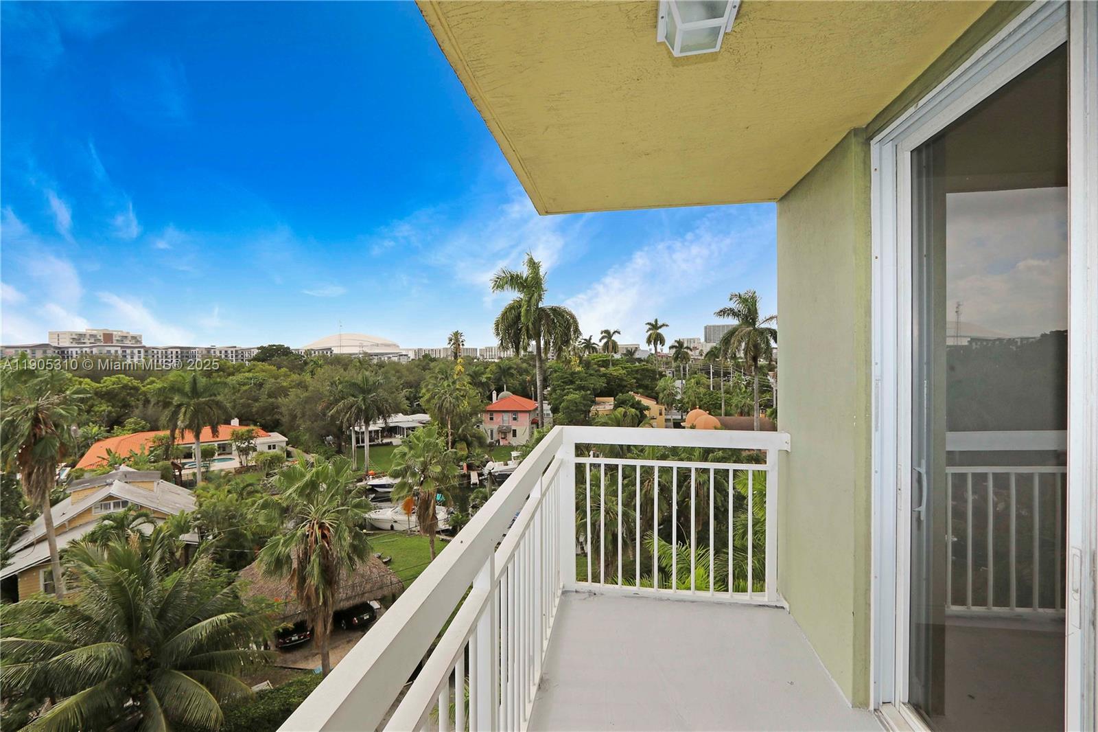 816 Northwest 11th Street, Unit 610 Miami, FL 33136 - Photo 3 of 28 a view of a balcony with an outdoor seating