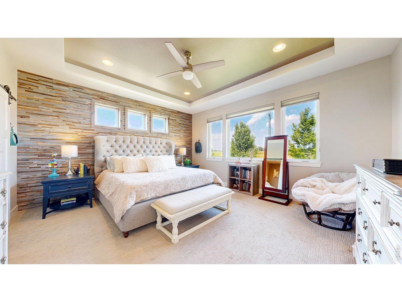 6990 Toponas Court Timnath, CO 80547 - Photo 13 of 44 a bedroom with a bed and a window