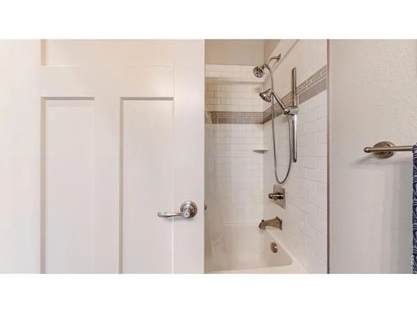 a bathroom with a sink and a shower
