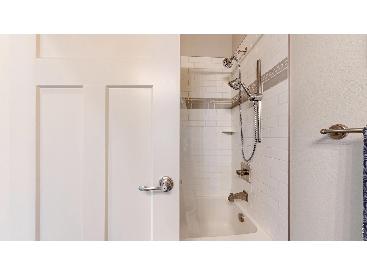 6990 Toponas Court Timnath, CO 80547 - Photo 20 of 44 a bathroom with a sink and a shower