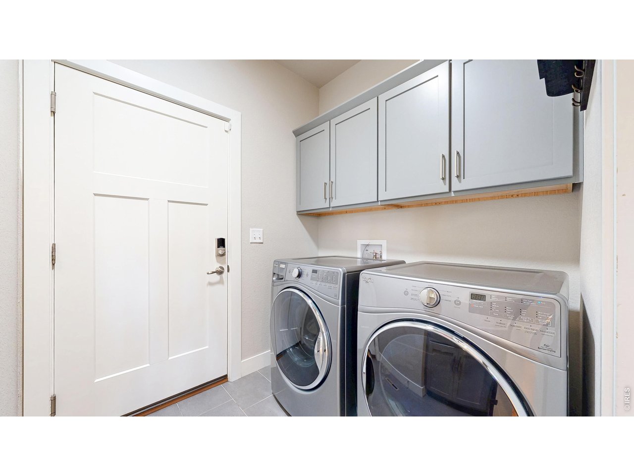 6990 Toponas Court Timnath, CO 80547 - Photo 30 of 44 a utility room with dryer and washer