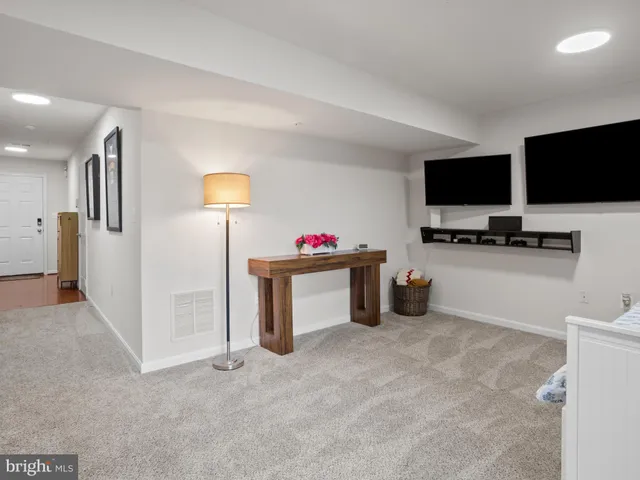 a storage & utility room with a flat screen tv