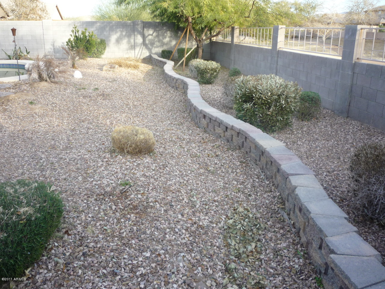 2621 West Darrel Road Phoenix, AZ 85041 - Photo 46 of 53 KNEE WALL IN BACK YARD