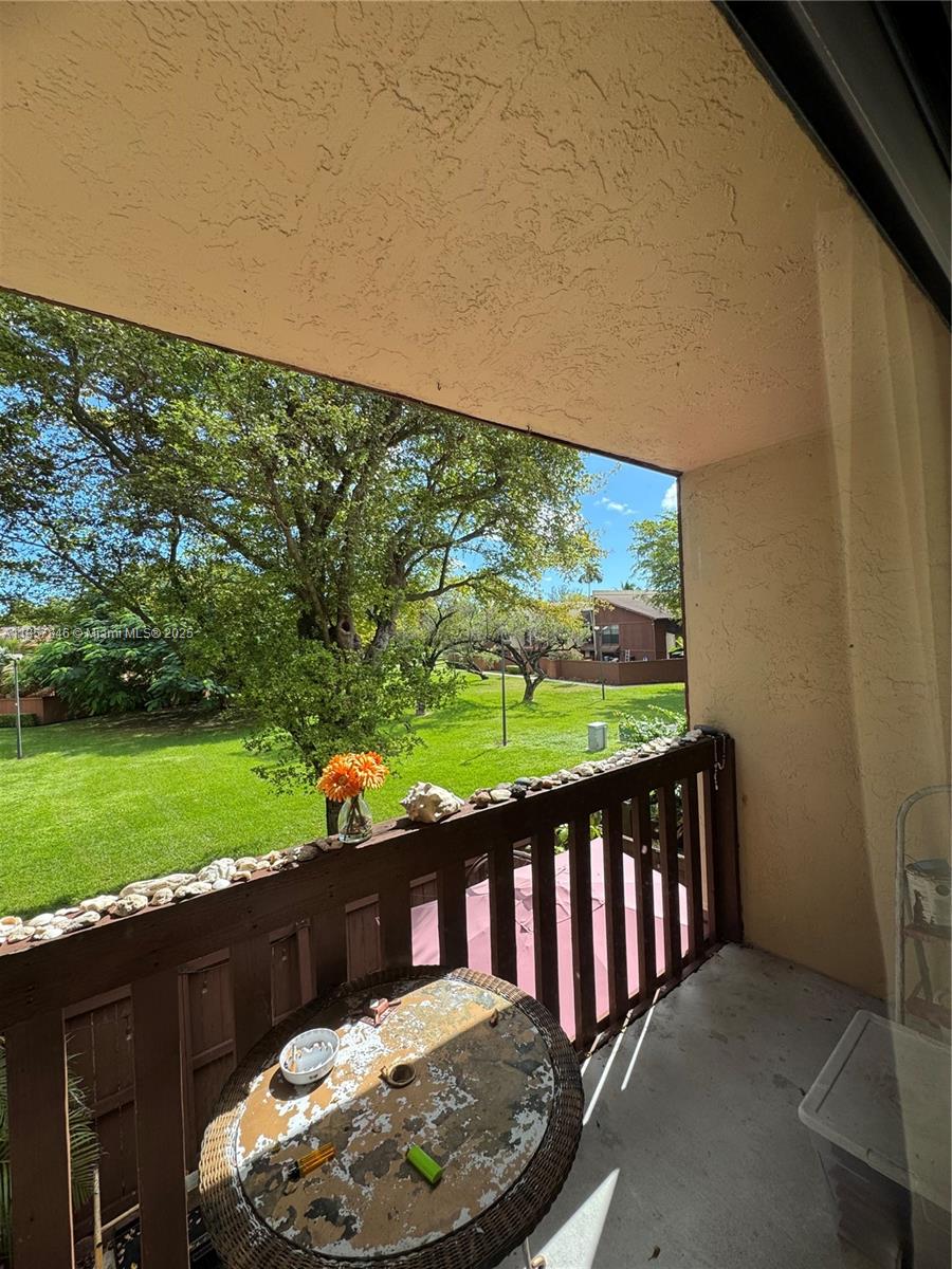 6445 Southwest 116th Place, Unit A Miami, FL 33173 - Photo 15 of 25 a view of a porch