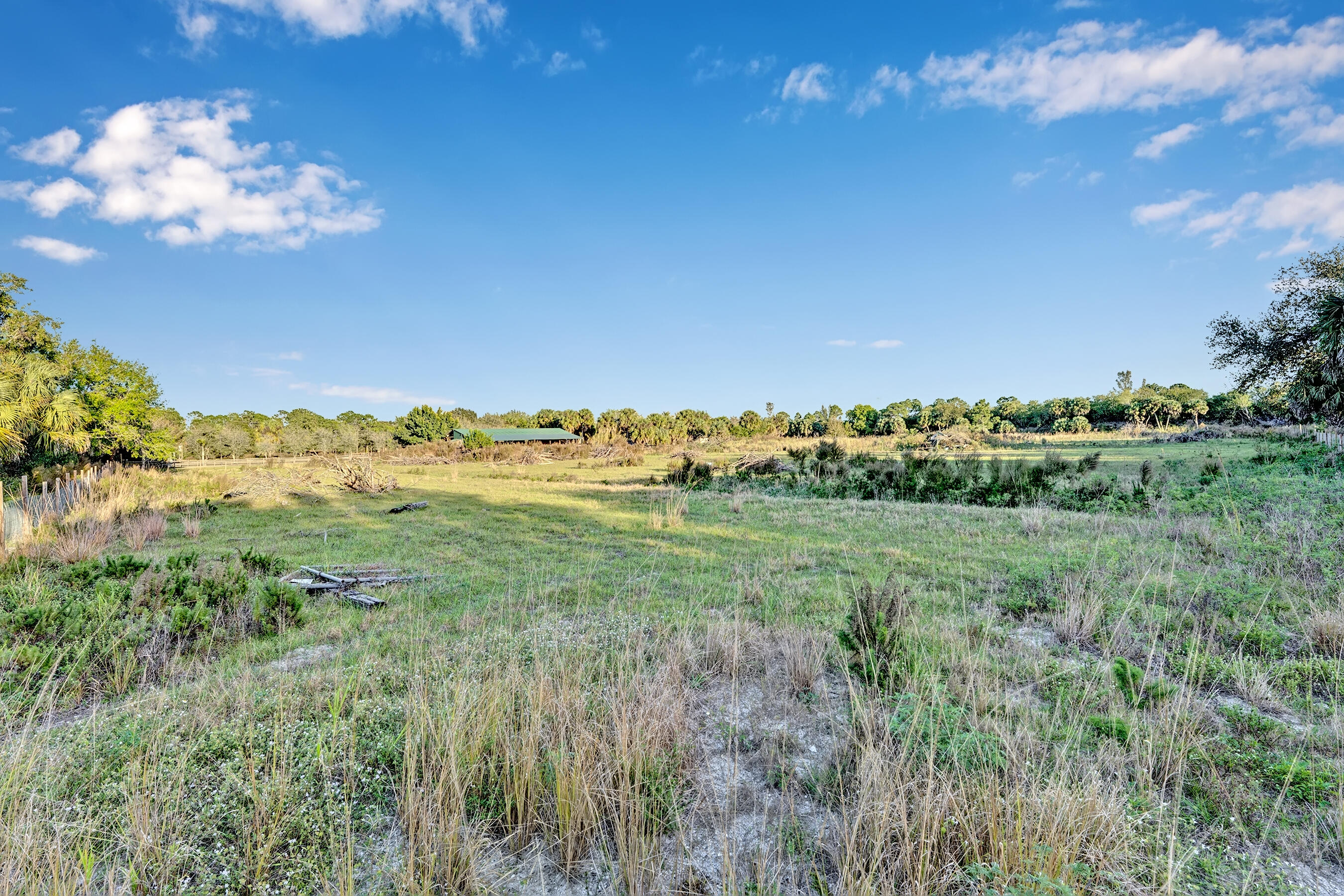4100 Windmill Road Loxahatchee, FL 33470 - Photo 13 of 15 a view of a city with lush green forest