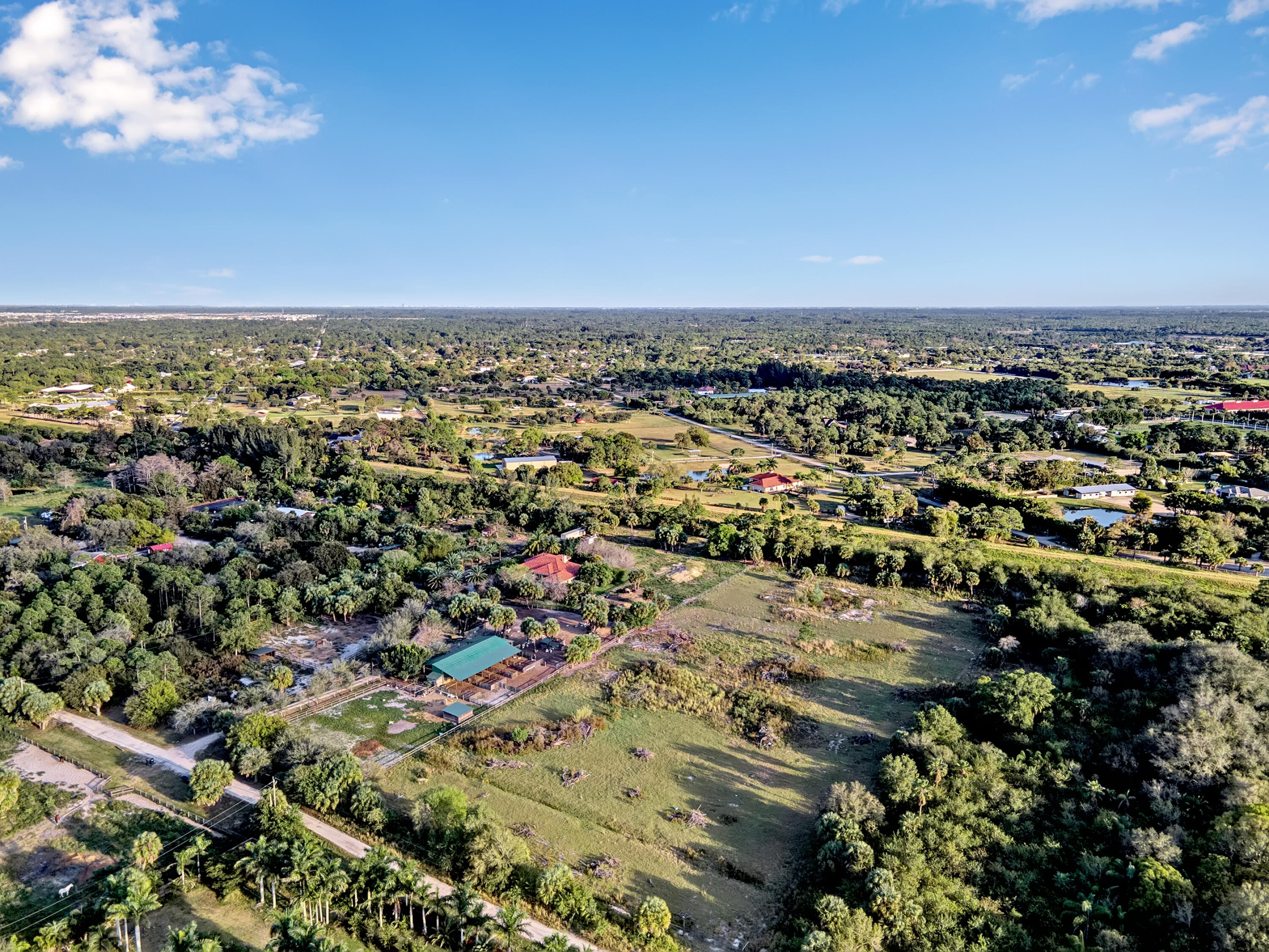 4100 Windmill Road Loxahatchee, FL 33470 - Photo 4 of 15 an aerial view of residential building and ocean