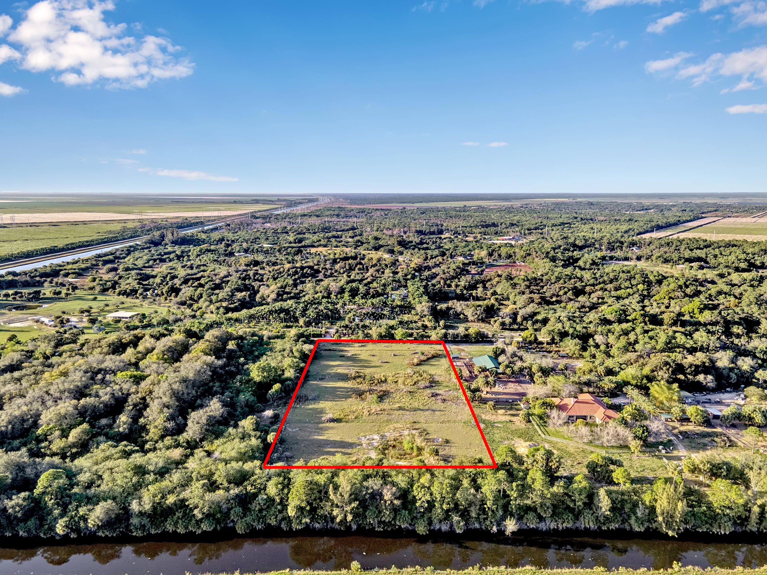 4100 Windmill Road Loxahatchee, FL 33470 - Photo 9 of 15 an aerial view of multiple house