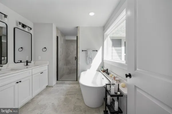 a view of a house with pool and a yard