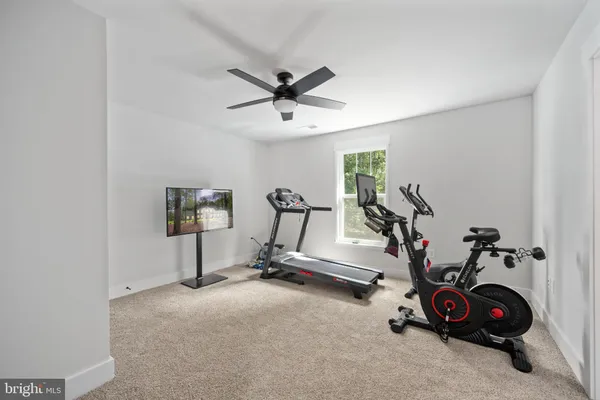 view of a kitchen with a refrigerator