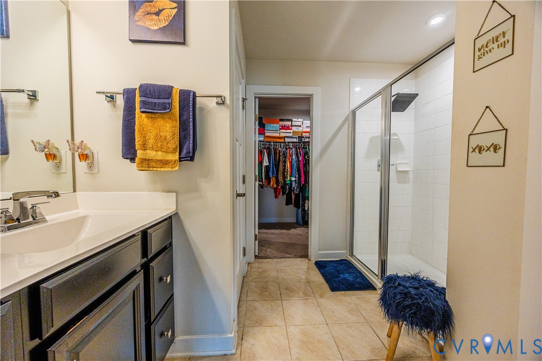4331 Ganymede Drive Chester, VA 23831 - Photo 31 of 40 a bathroom with a sink and a mirror