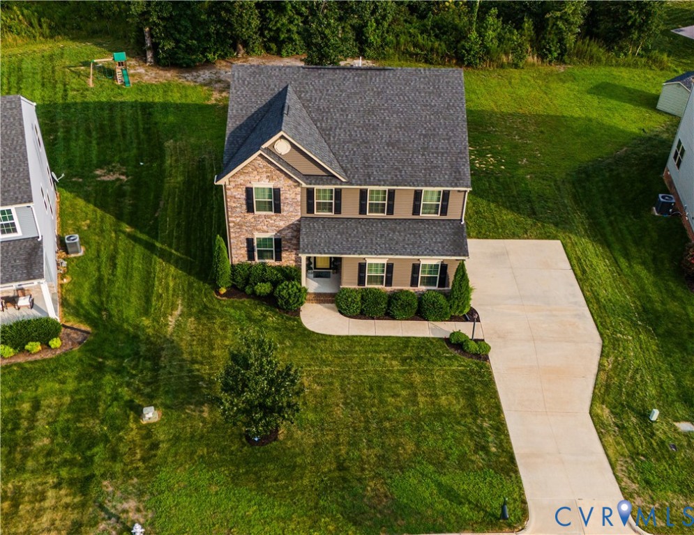 4331 Ganymede Drive Chester, VA 23831 - Photo 37 of 40 a aerial view of a house next to a big yard and large trees