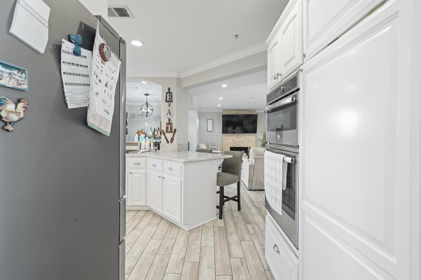16935 Pine Way Morgan Hill, CA 95037 - Photo 11 of 50 a room with white cabinets and white appliances