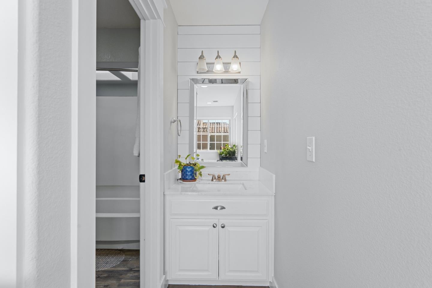 16935 Pine Way Morgan Hill, CA 95037 - Photo 28 of 50 a bathroom with a sink and a mirror